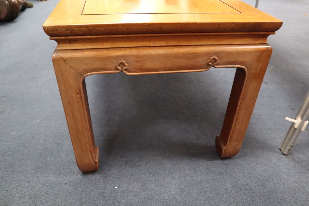 A Chinese hardwood coffee table, width 122cm, depth 46cm, height 40cm
